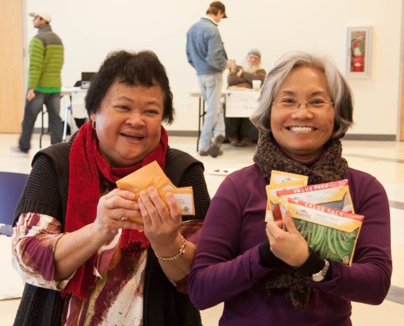 gardeners selecting seed packets