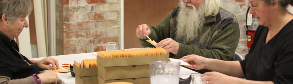 Dan Cullimore helping package seeds