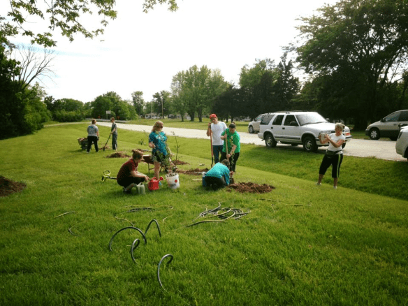 people planting at D.H. Crum garden