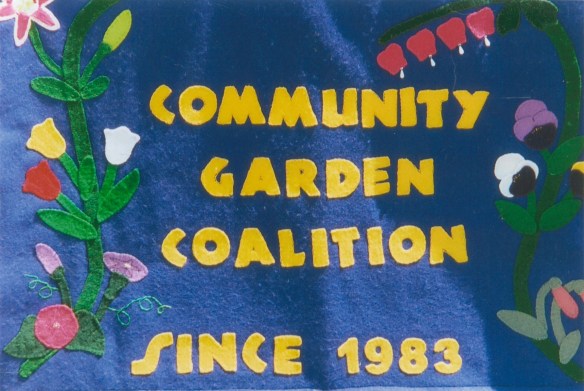 Felt banner saying "Community Garden Coalition Since 1983"