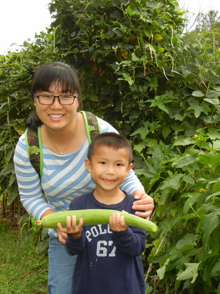 Mom & son with asian gourd
