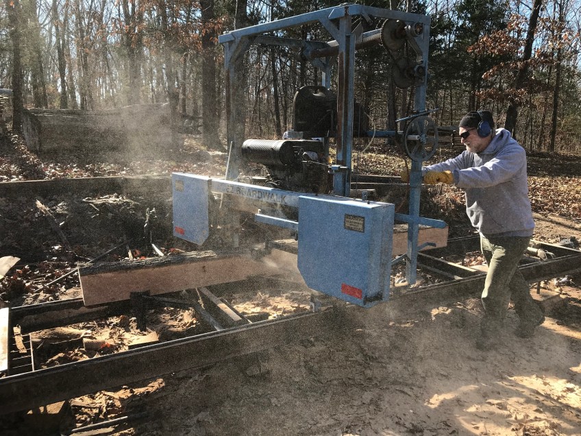 milling lumber into boards for raised beds
